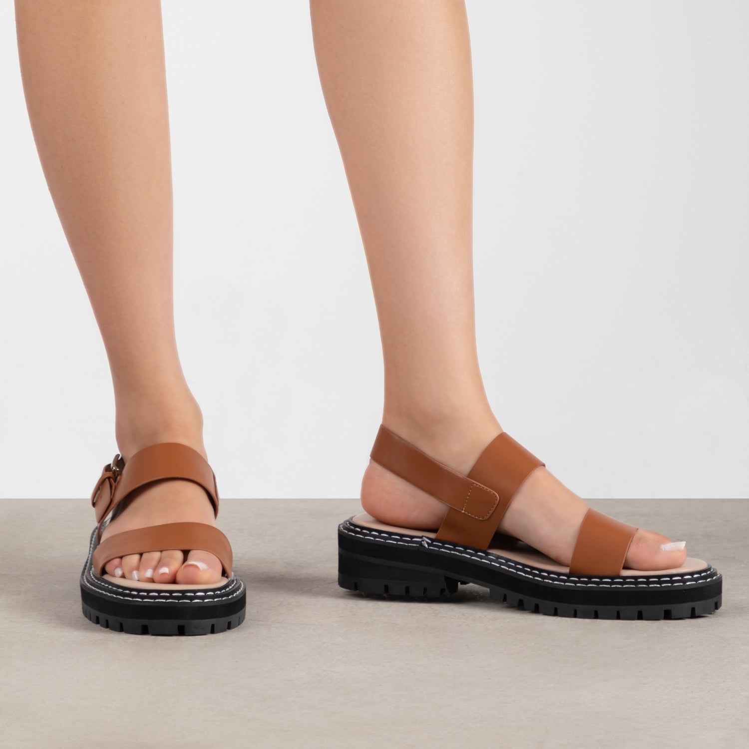 RAID Aditi Flat Sandal in Brown